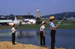 Amish boys fishing by Dennis L. Hughes