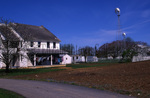 Amish farmhouse with windmills by Dennis L. Hughes