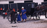Two Amish women and girl by Dennis L. Hughes