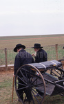 Amish men talking by Dennis L. Hughes