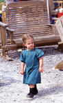 Amish girl in blue dress by Dennis L. Hughes