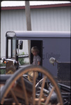 Amish boy in buggy by Dennis L. Hughes