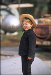 Amish boy winking by Dennis L. Hughes