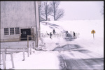 Amish children sledding by Dennis L. Hughes