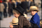 Amish boy looks to side by Dennis L. Hughes