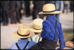 Amish boys face away from camera by Dennis L. Hughes