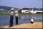 Three boys fishing in pond by Dennis L. Hughes
